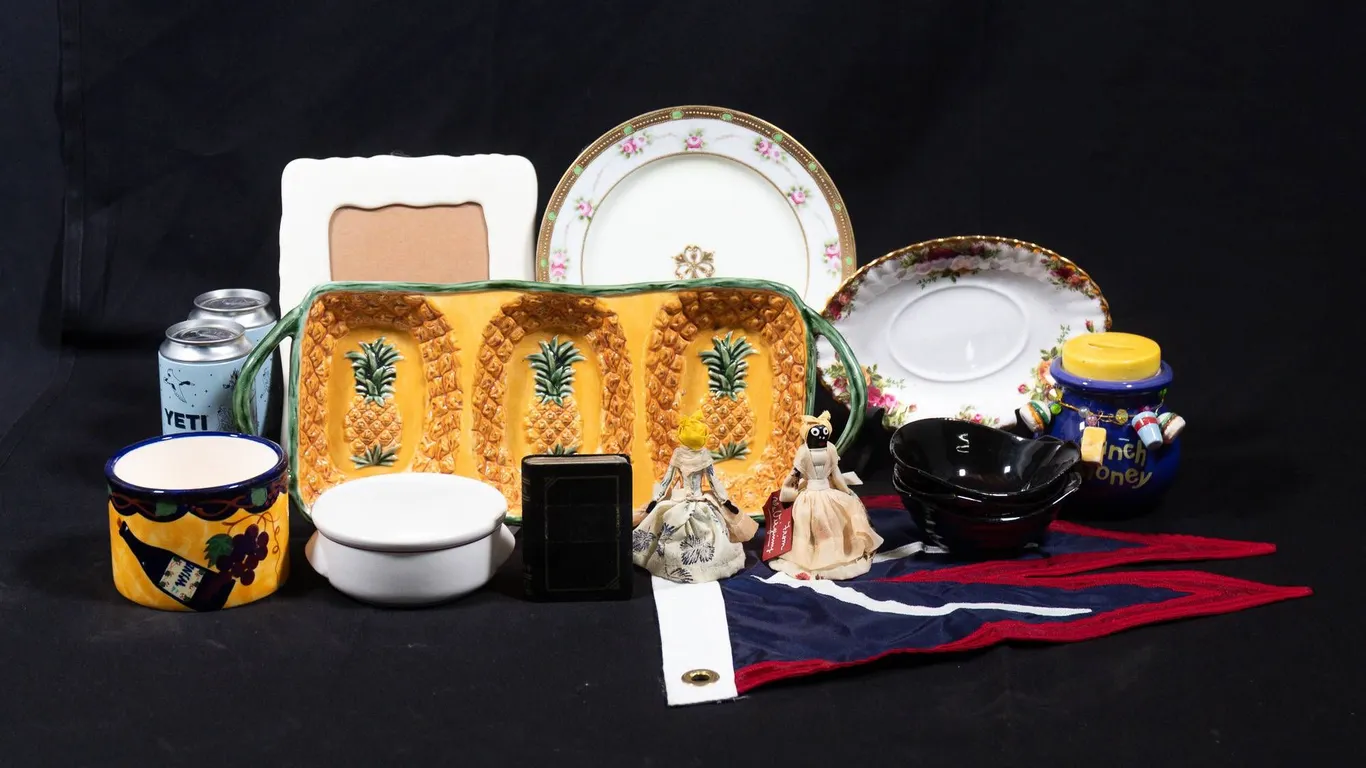 ECLECTIC DECOR COLLECTION INCLUDING BLACK AMERICANA BELL DOLLS, PINEAPPLE TRAY, AND MORE.