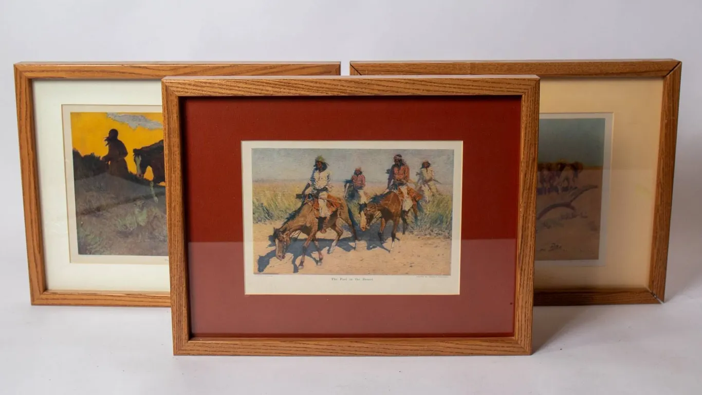 THREE FRAMED FREDERICK REMINGTON PRINTS.