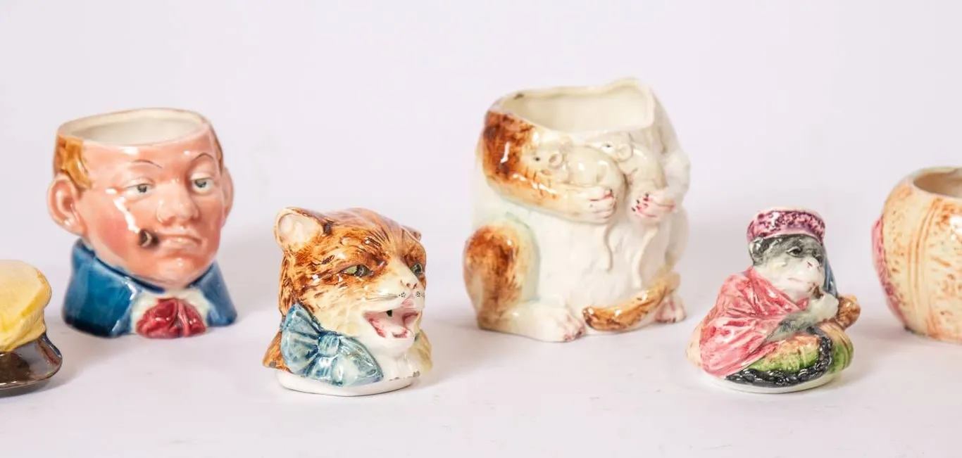CERAMIC FIGURINES INCLUDING TOBACCO JARS AND HUMIDOR 6" H.