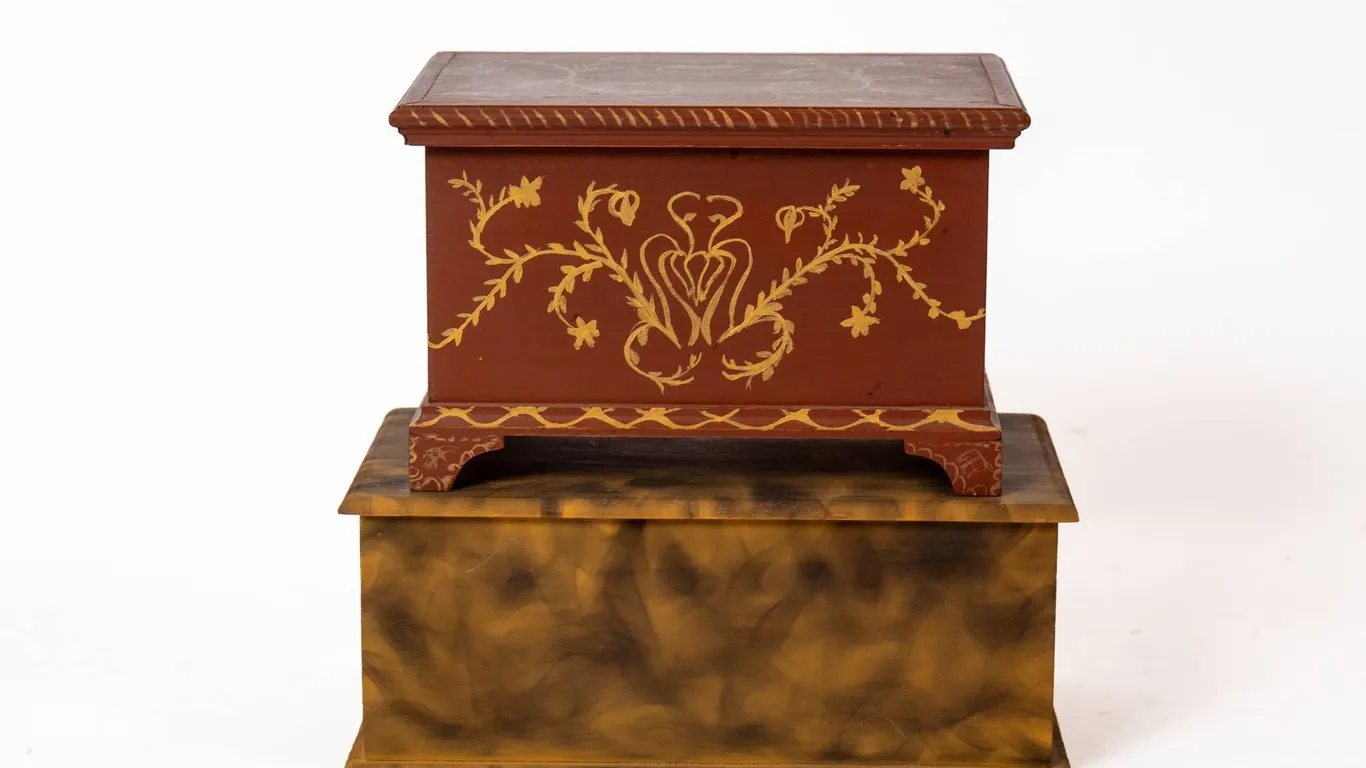 TWO REPRODUCTION WOODEN BOXES WITH FOLK ART STYLE.