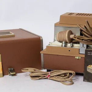 ARGUS PROJECTOR WITH WOODEN DRAWERS AND ACCESSORIES.