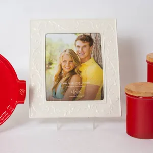 CHANTAL RED CANISTERS, LENOX FRAME, PEUGEOT RED PIE PLATE.