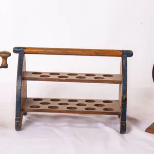 TWO ANTIQUE COFFEE GRINDERS AND TWO TIER WOODEN EGG HOLDER.