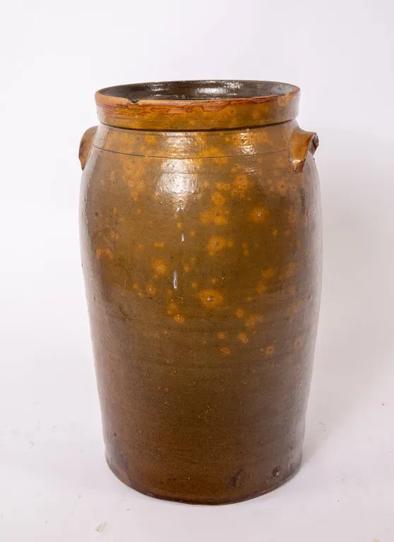 ANTIQUE BROWN GLAZED OVOID JAR WITH HANDLES.