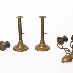 BRASS PUSHUP CANDLESTICKS AND CANDLE SCONCES.
