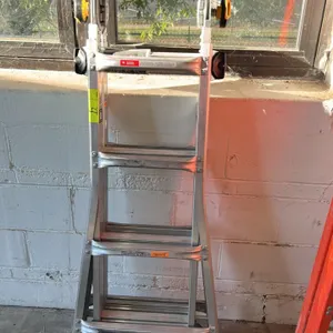 Gorilla Ladders MPXA aluminum multi-position ladder. Features adjustable position hinges and Type IA 300 lb. load capacity. 18' reach. Orange ladder i