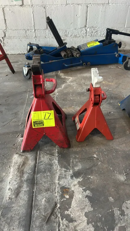 3-ton steel ratchet jack stands. Features steel construction, ratchet-style height adjustment, and wide pyramid bases. Finished in red. Note: Stands a