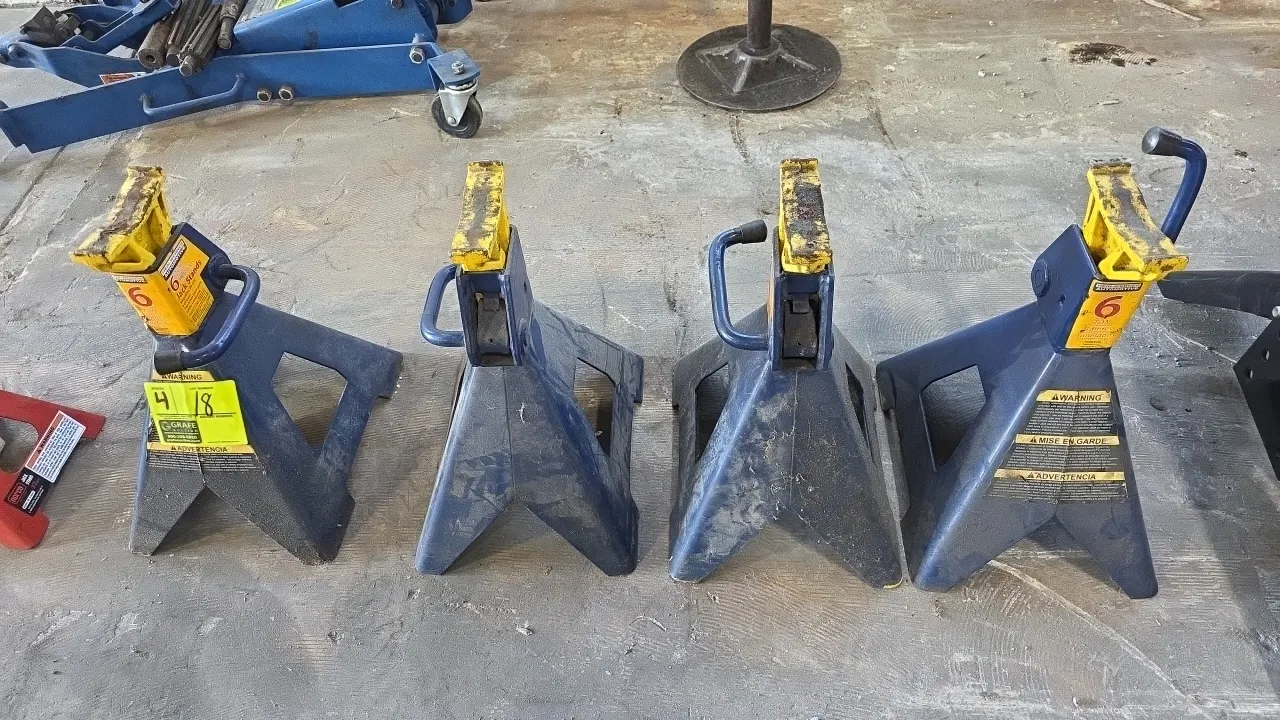 Hein-Werner 6-ton jack stands. Features ratcheting height adjustment, wide steel bases, cast support columns, and release handles. 12,000 lb capacity.