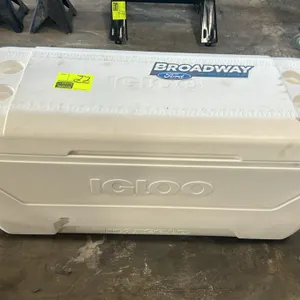 Igloo MaxCold cooler. Features white plastic construction, molded cup holders, integrated lid ruler, side swing-up carry handles, and drain plug. 3'L.