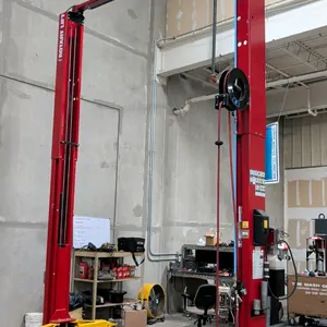 Rotary Lift SP012N7T8 two-post automotive lift. Features 12,000 lb capacity, overhead crossbeam, swing arms, hydraulic power unit, and an attached Gra