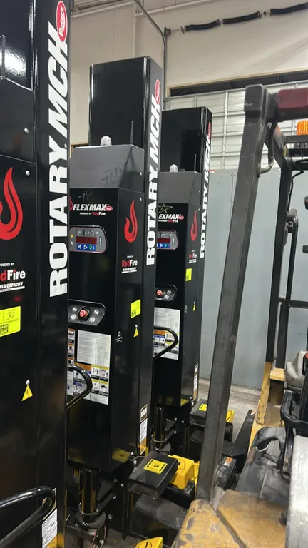 Rotary MCHM419U100 portable mobile column lifts. Features FlexMax RedFire wireless operation, adjustable wheel lifting forks, integrated digital displ