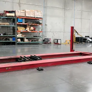 Rotary SM30N010 four-post drive-on vehicle lift. Features 30,000 lb capacity, drive-on runways with approach ramps, dual rolling bridge jacks, and an 