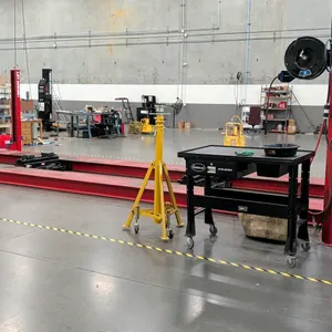 Rotary SM30N012 4-post drive-on vehicle lift. Features 30,000 lb capacity, dual runways, approach ramps, and (2) rolling bridge jacks. S/N: KIY17K0004