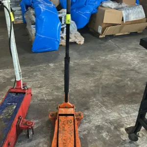 Daytona hydraulic floor jack. Features steel construction, rapid pump foot pedal, handle with protective foam bumper, front rollers, and rear swivel c