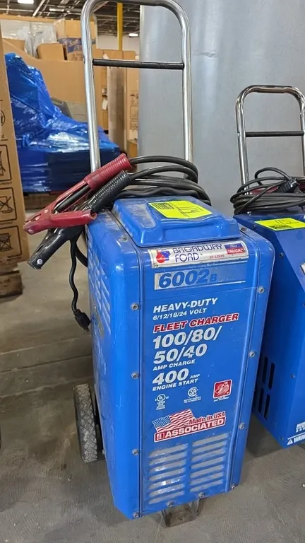 Associated 6002B heavy-duty battery fleet charger. Features 6/12/18/24V operation, 100/80/50/40 amp charge rates, 400 amp engine start, and attached c