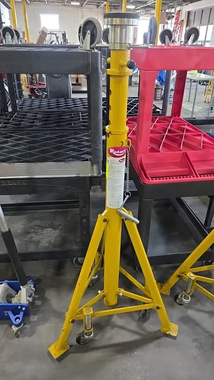 Rotary RS18 portable support stand. Features 18,000 lb capacity, threaded screw fine adjustment with round rubber pad, dual positioning handles, and l
