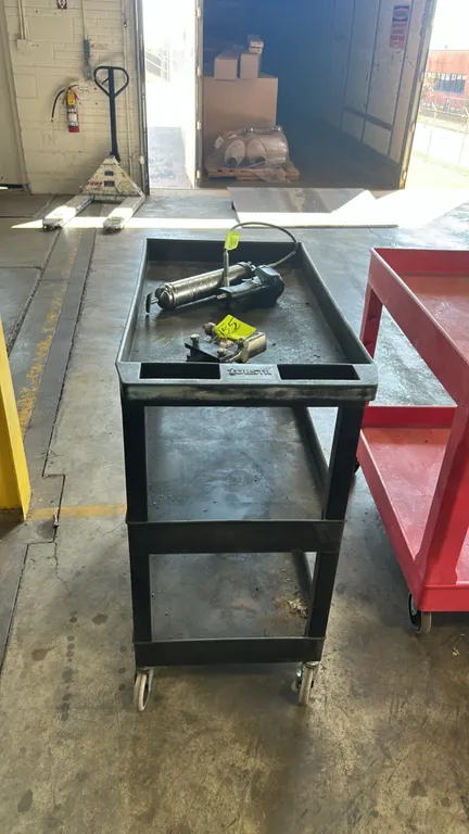 Tubstr 3-tier poly utility cart. Features three deep lipped shelves and a molded push handle with integrated utility compartments. 3'L. Mounted on fou