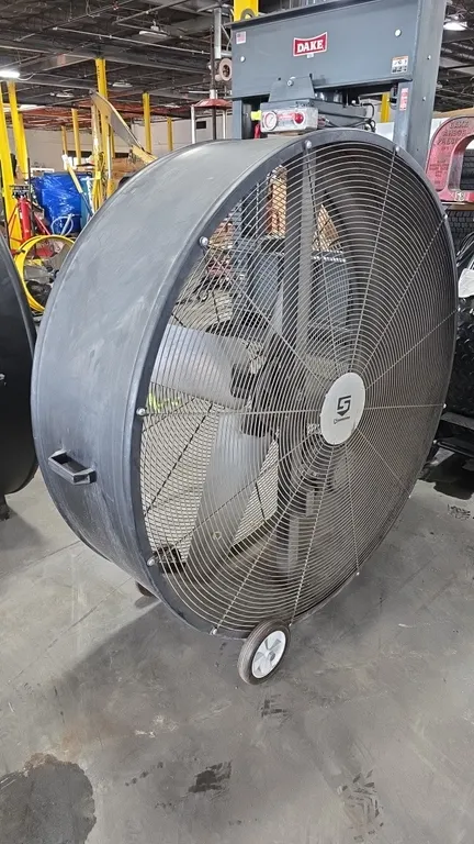 2022 Strongway 4742845 48" belt drive drum fan. Features a 4-blade fan, front and rear wire safety guards, and integrated transport handle. 48" diamet
