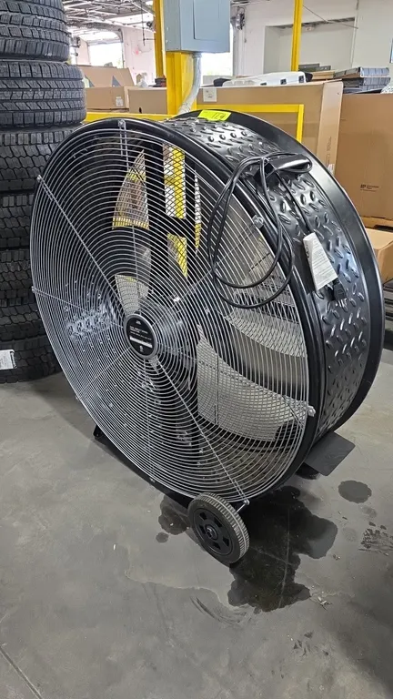 2024 Strongway 5025661 42" direct drive drum fan. Features a 3-blade steel propeller, diamond plate textured steel drum housing, wire safety guards, a