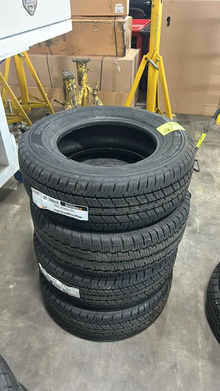 Hankook Dynapro HT RH12 highway all-season tires. Size: 235/65R16. Load range: 10PR.