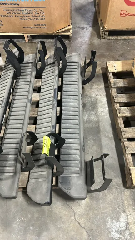 Ford OEM side step running boards. Features textured step surface and attached mounting brackets. 53"L.