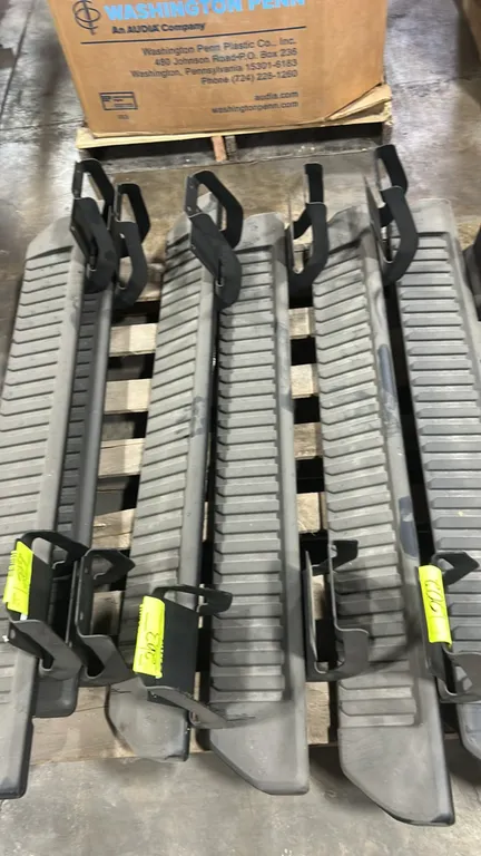 Ford OEM side step running boards. Features textured non-slip step pads and integrated mounting brackets. 53"L. Note: Includes pair marked with lot ta