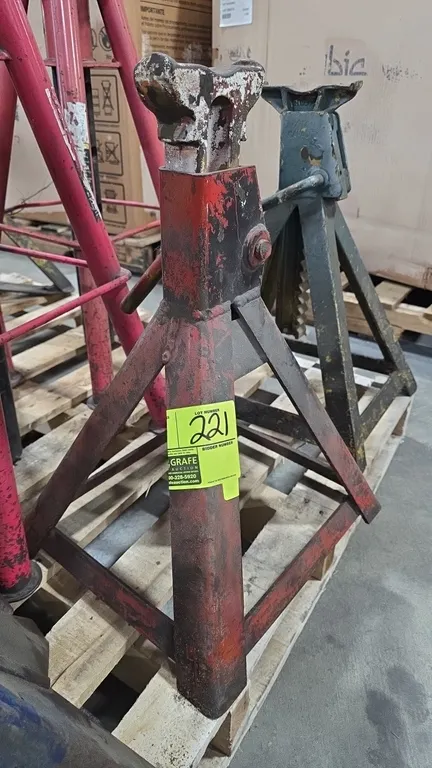 Assorted adjustable jack stands. Features welded steel pyramid bases, ratcheting cast support columns, and release handles. Includes 10-ton and 7-ton