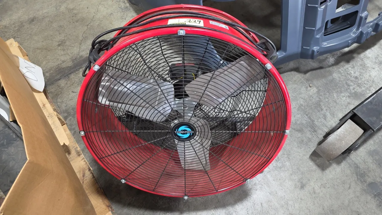 Tornado HI-FAN-DRUM24W-1P portable tilt blower drum fan. Features a 3-blade aluminum propeller, metal housing with front and rear wire grilles, built-