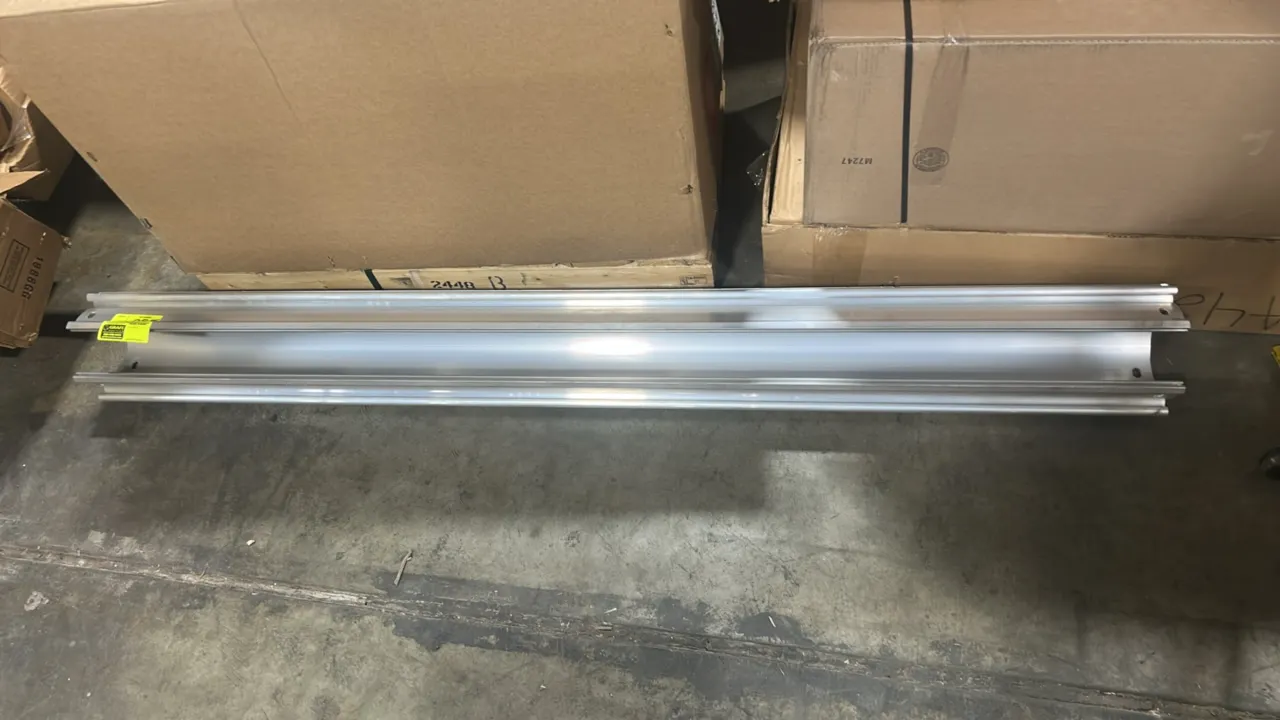 Extruded aluminum side rail. Features channeled profile and pre-drilled mounting slots. Dimensions: 78"L.
