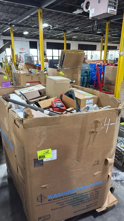 Assorted Ford vehicle parts and automotive fluids pallet lot. Includes Motorcraft Mercon LV automatic transmission fluid, O'Reilly ATF, axle shaft, ho