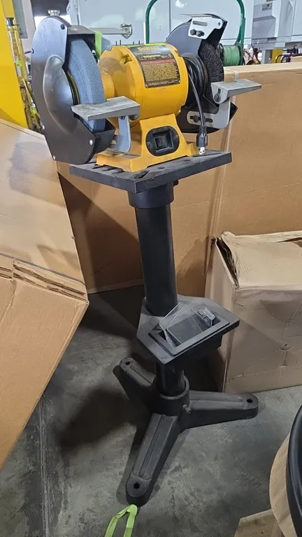2021 DeWalt DW758 8" bench grinder. Features left grinding wheel, right wire wheel, adjustable tool rests, and detached clear eye shields. 3,600 RPM w