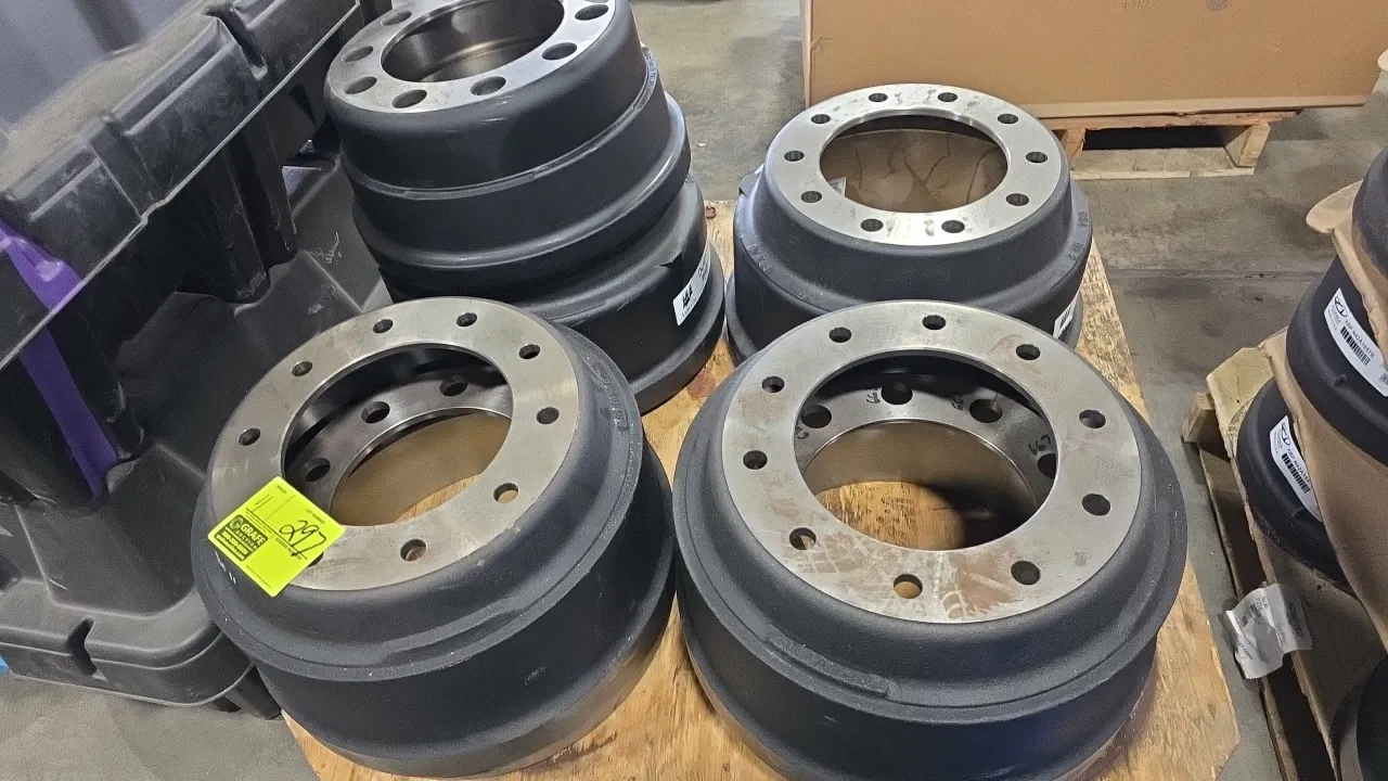 Assorted heavy-duty cast iron outboard-mounted brake drums. Features 10-hole hub-piloted mounting. Includes various brands and part numbers such as Ar