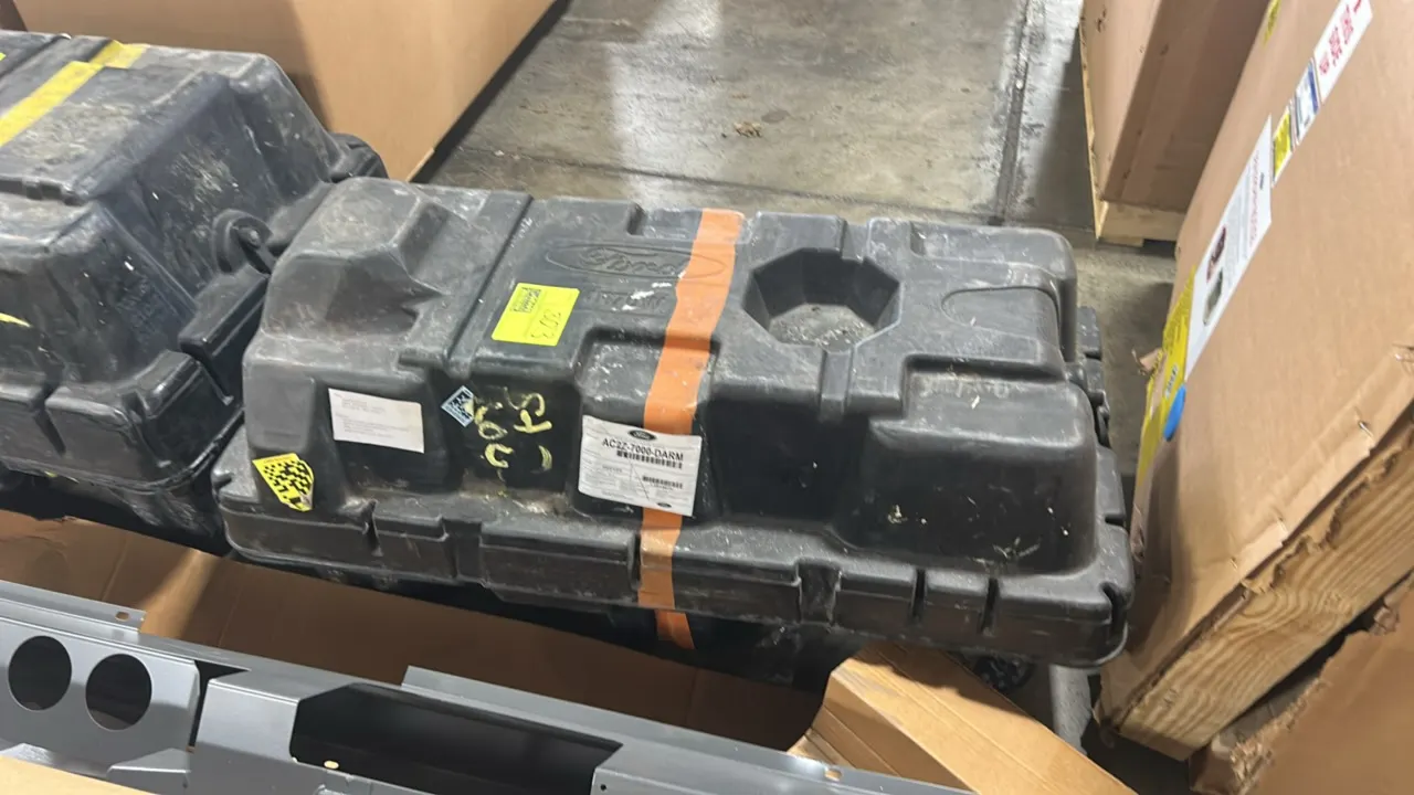 Ford remanufactured automatic transmission assembly. Part number AC2Z-7000-DARM. Includes heavy-duty plastic shipping container. S/N: L2014670. Note: