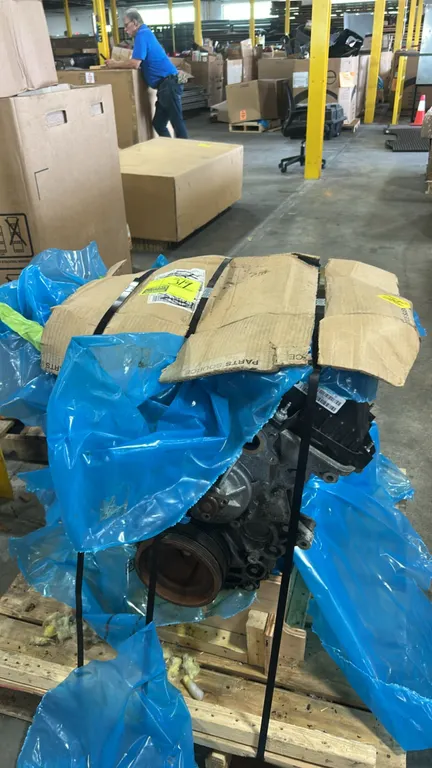 Ford Duratec V6 engine assembly. Features aluminum cylinder heads and block, composite valve covers, and harmonic balancer. Labeled LEP Duratec V6 wit