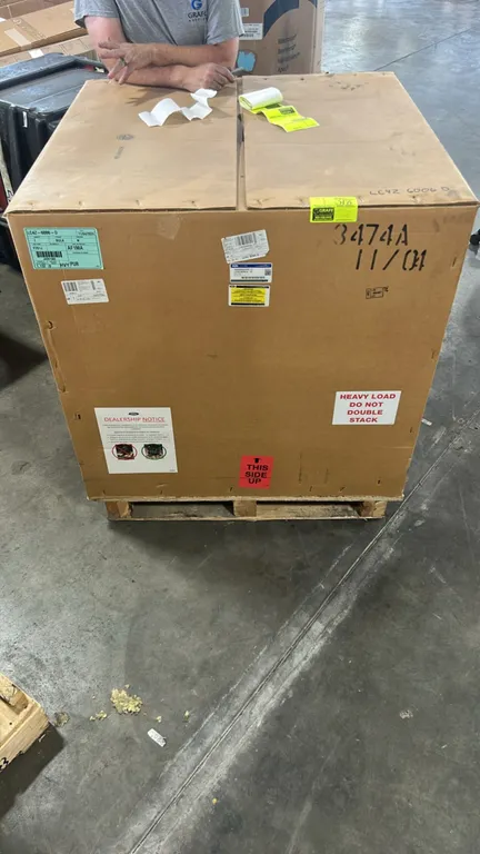 Ford LC4Z-6006-D long block engine assembly. Genuine Ford service replacement motor, crated and wrapped in protective plastic. Mounted on a wooden shi
