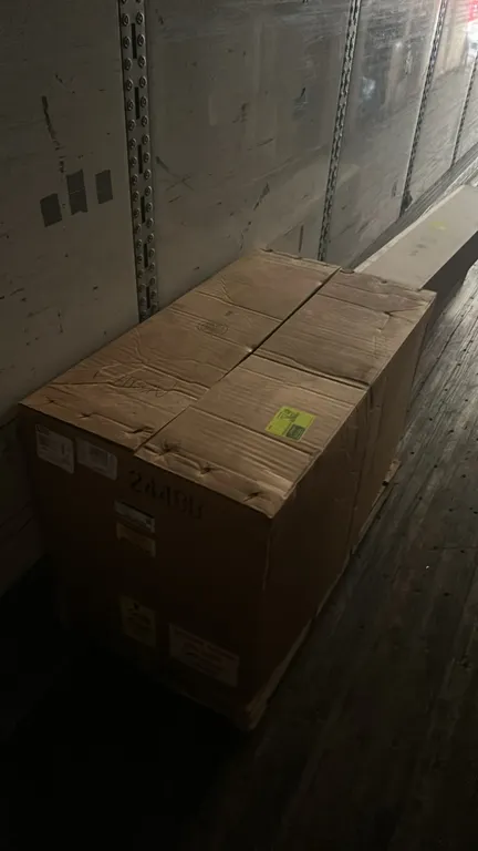 Ford JL3Z-7000-F automatic transmission assembly. Genuine OEM Ford component. Packaged in original box, secured to wooden base with protective wrap.