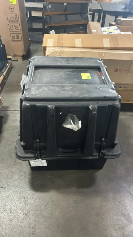 Ford BC3Z-6006-BARM remanufactured service engine assembly. Secured with tie-down straps inside a heavy-duty molded plastic shipping container with la