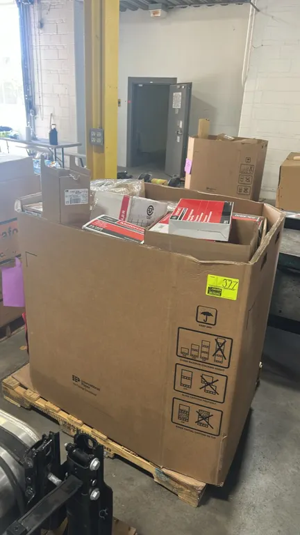 Motorcraft and assorted automotive parts lot in Gaylord container. Includes Motorcraft FP-92 cabin pollen filters, FA-2031 and FA-1928 engine air filt