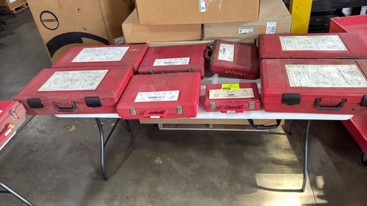 Ford Rotunda essential special service tool sets. Assorted automotive special service kits housed in red blow-molded carrying cases with labeled lid d