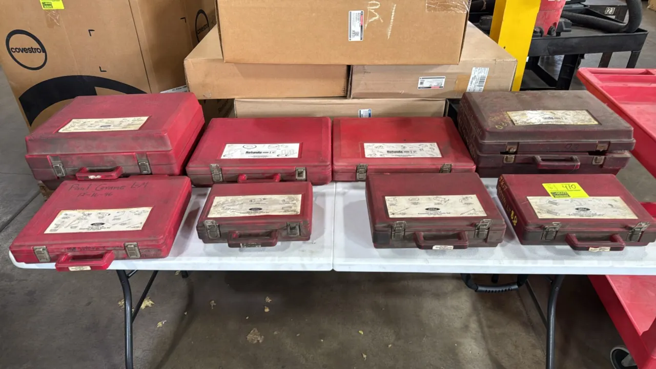 Ford Rotunda essential special service tool sets. Assorted automotive diagnostic and mechanical specialty service kits housed in molded red plastic ha
