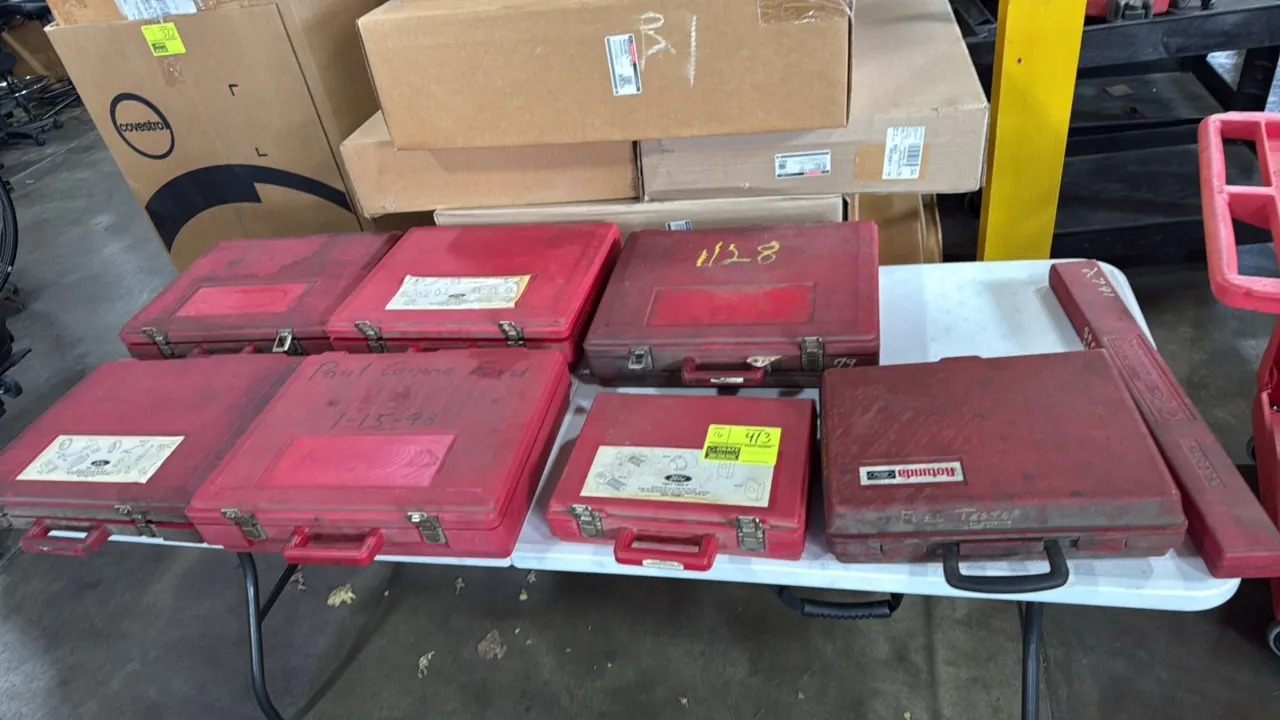 Ford Rotunda essential special service tool sets. Assorted automotive specialty tools in molded red plastic cases, including power steering analyzer,