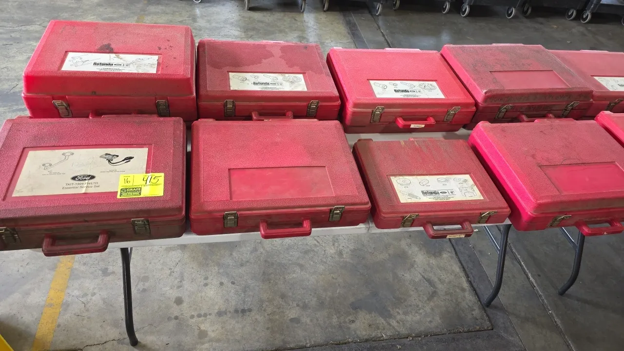 Ford Rotunda essential special service tool sets. Assorted automotive service kits housed in red hard-shell molded carry cases with latch closures. Fe