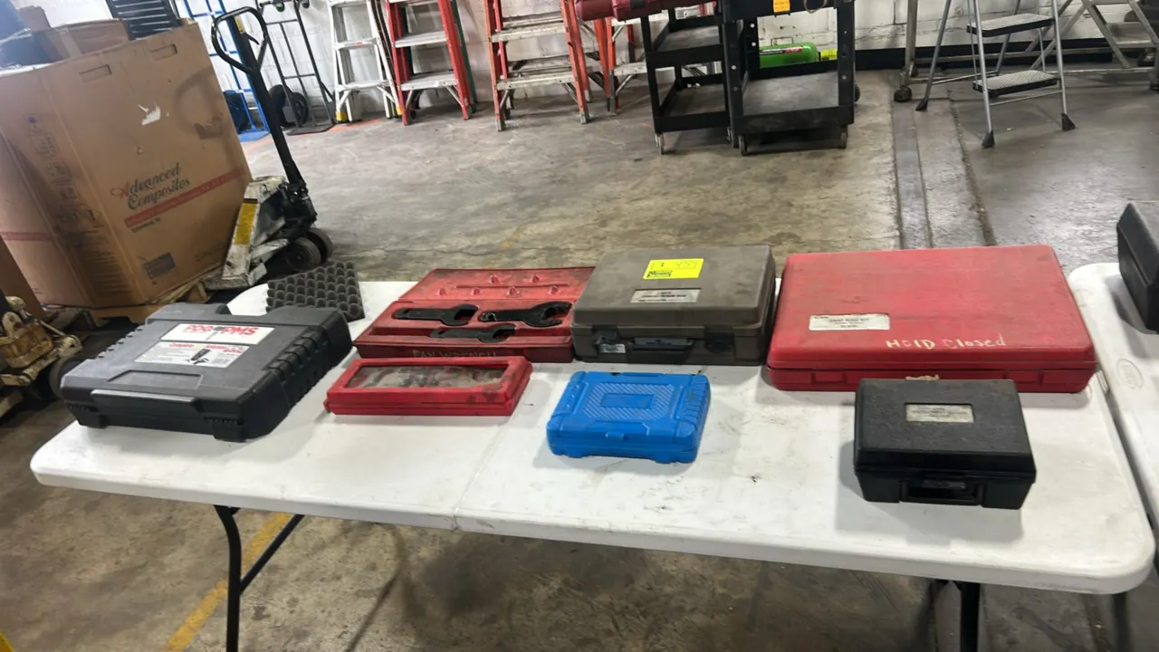 Assorted automotive specialty service tool sets. Includes Kent-Moore J-48540 crankcase pressure gauge kit, Steelman ChassisEAR, Pro-Max exhaust manifo