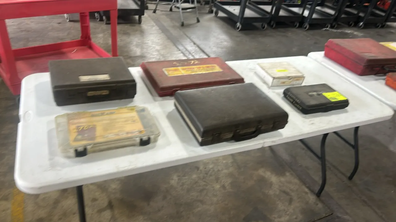 Assorted automotive specialty and diagnostic tool sets. Includes Irwin Hanson tap and die set, Ford Rotunda power steering analyzer and service tools,