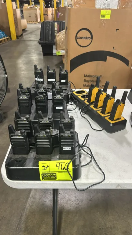 Retevis and DeWALT two-way radios with multi-unit charging stations. Includes Retevis handheld radios with multi-bay charging docks and DeWALT handhel