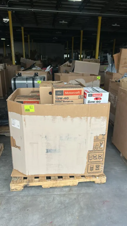 Motorcraft assorted automotive fluids in Gaylord container. Includes cased quantities of SAE 15W-40 Super Duty diesel motor oil, MERCON ULV automatic
