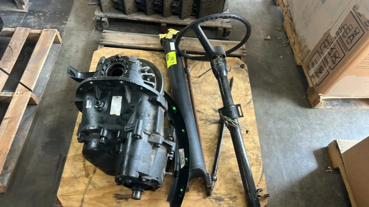 Commercial truck differential carrier and automotive steering column lot. Includes commercial truck differential carrier assembly, GM-style steering c