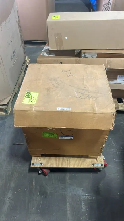 Ford OEM differential and carrier assembly, part number GU9Z-4200-C. In original shipping container. Dolly not included.