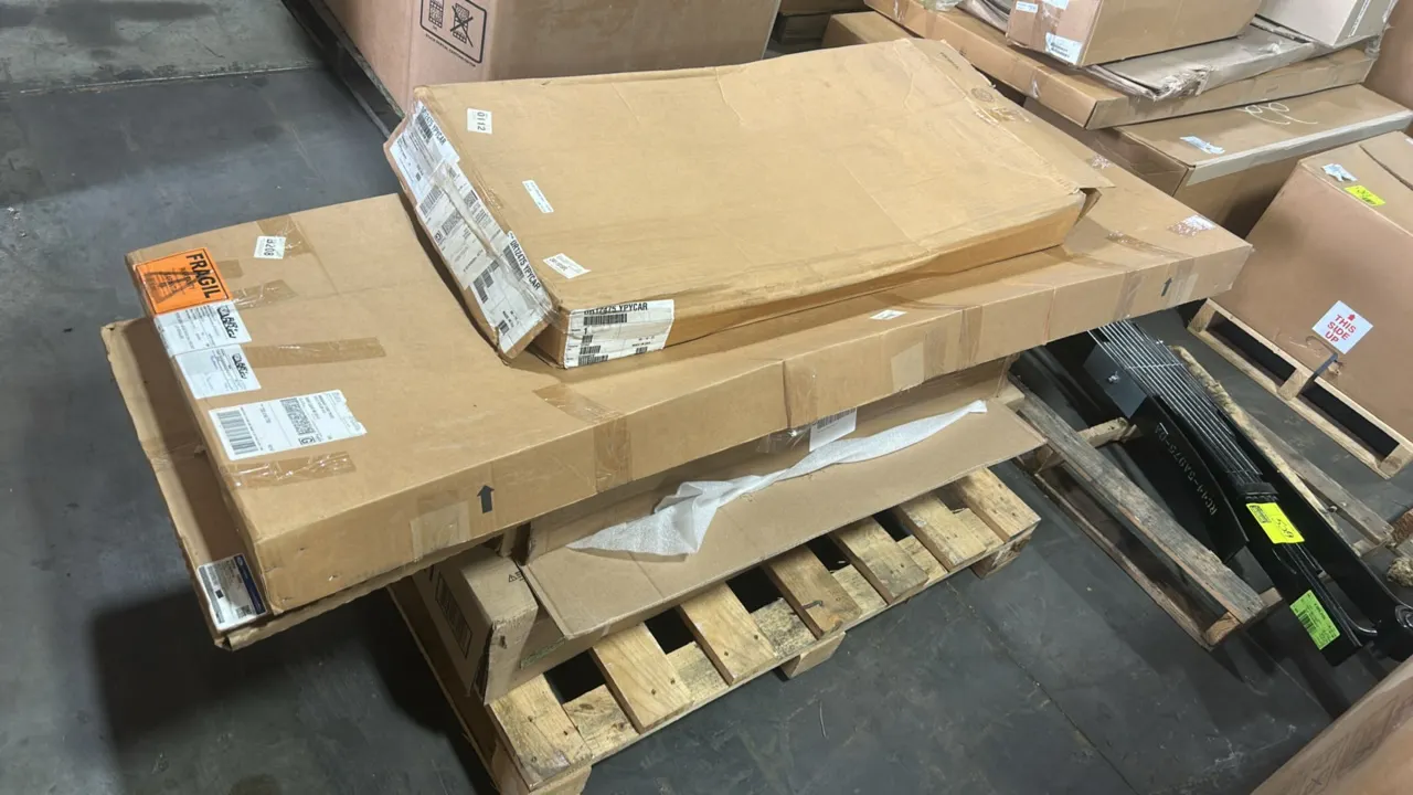 Ford automotive parts pallet lot. Includes Ford OEM automotive replacement glass (P/N: DR12475 YPYCAR), Air Design Ford S650 Mustang 2024+ front lip s