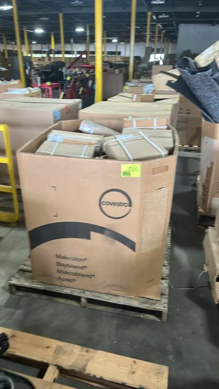 Ford and Motorcraft brake rotors and assorted automotive parts lot. Includes Motorcraft BRRF-458 (CK4Z-1125-J) rotor, BRRF-375 (HC3Z-1102-J) rotor and
